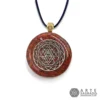 Vista frontal del Collar Mini Orgón Sri Yantra en Plata 0.925 con Jaspe Rojo con cadena de tela sobre fondo blanco